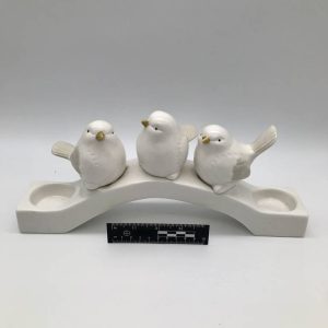 Ceramiczne ptaszki na ozdobnej podstawie